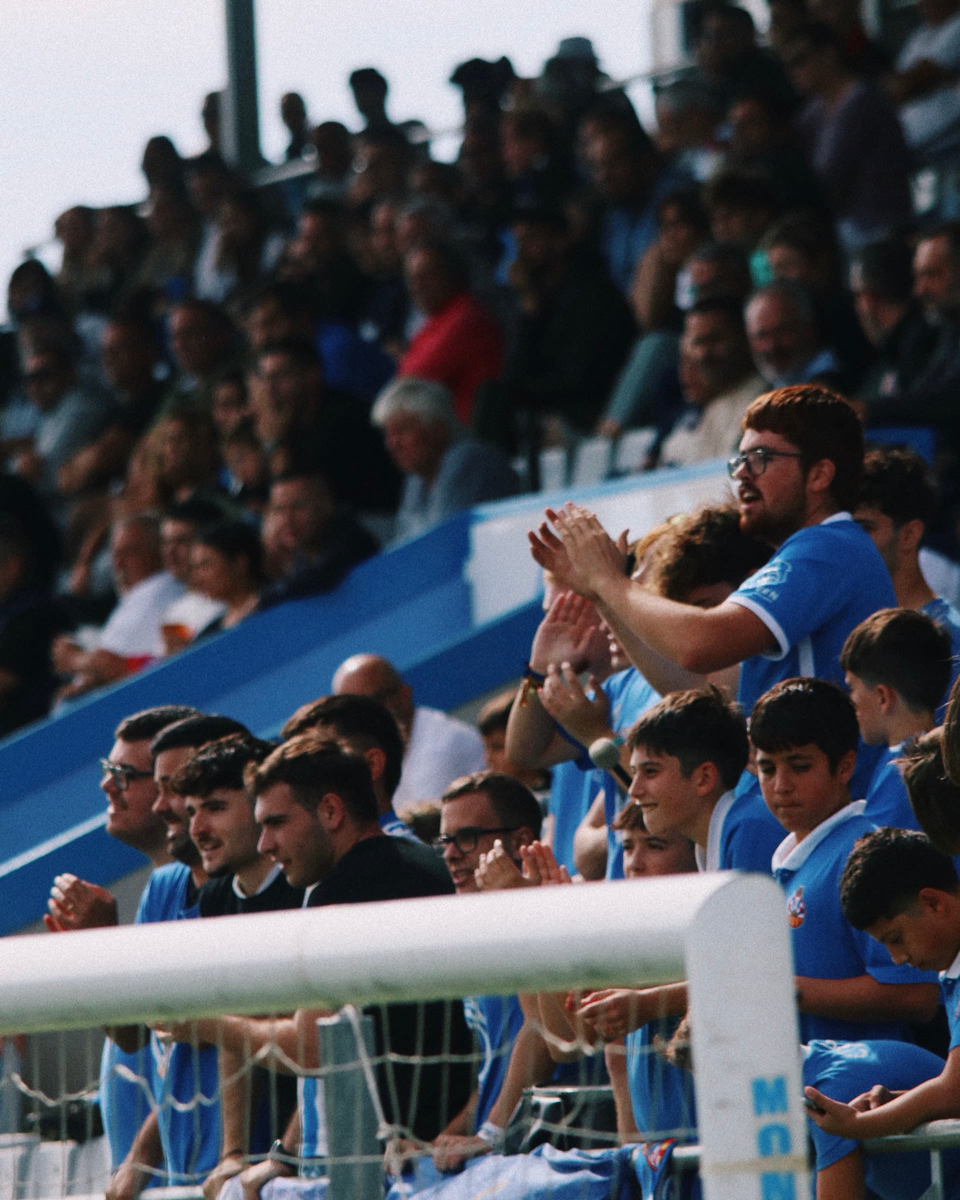 CF Vilanova supporters and players at stadium